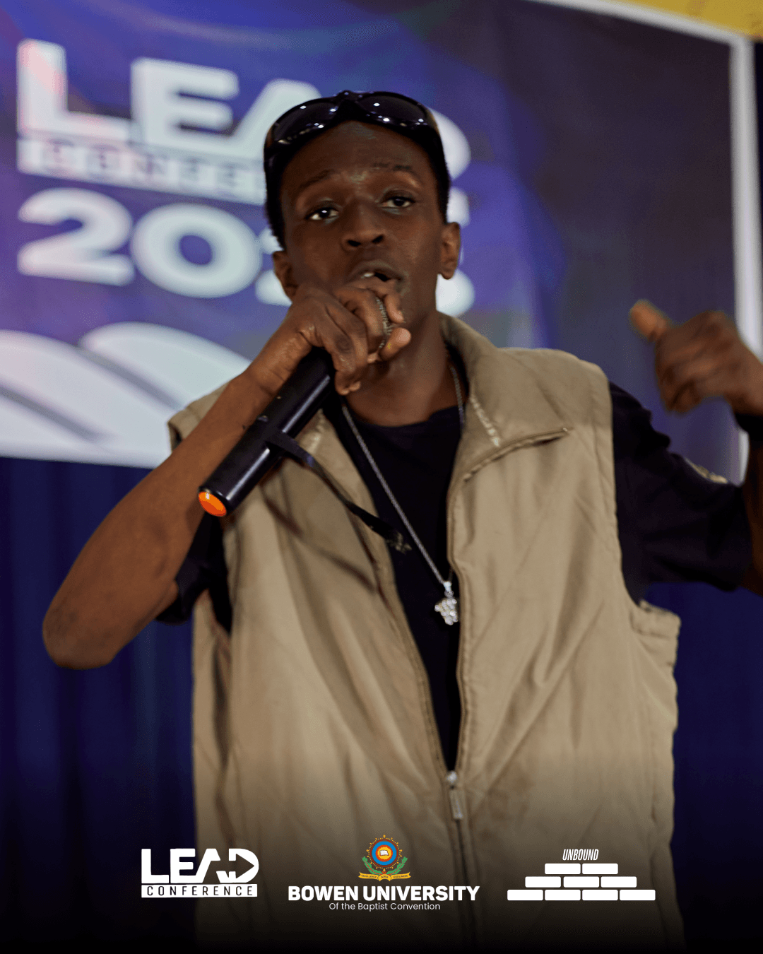 A speaker addressing delegates on stage at LEAD Conference 2025